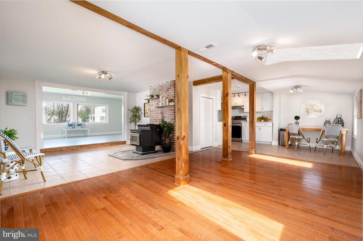 626 Clark Avenue Deale, MD 20751 - Photo 6 of 74 a view of a livingroom with furniture and a flat screen tv