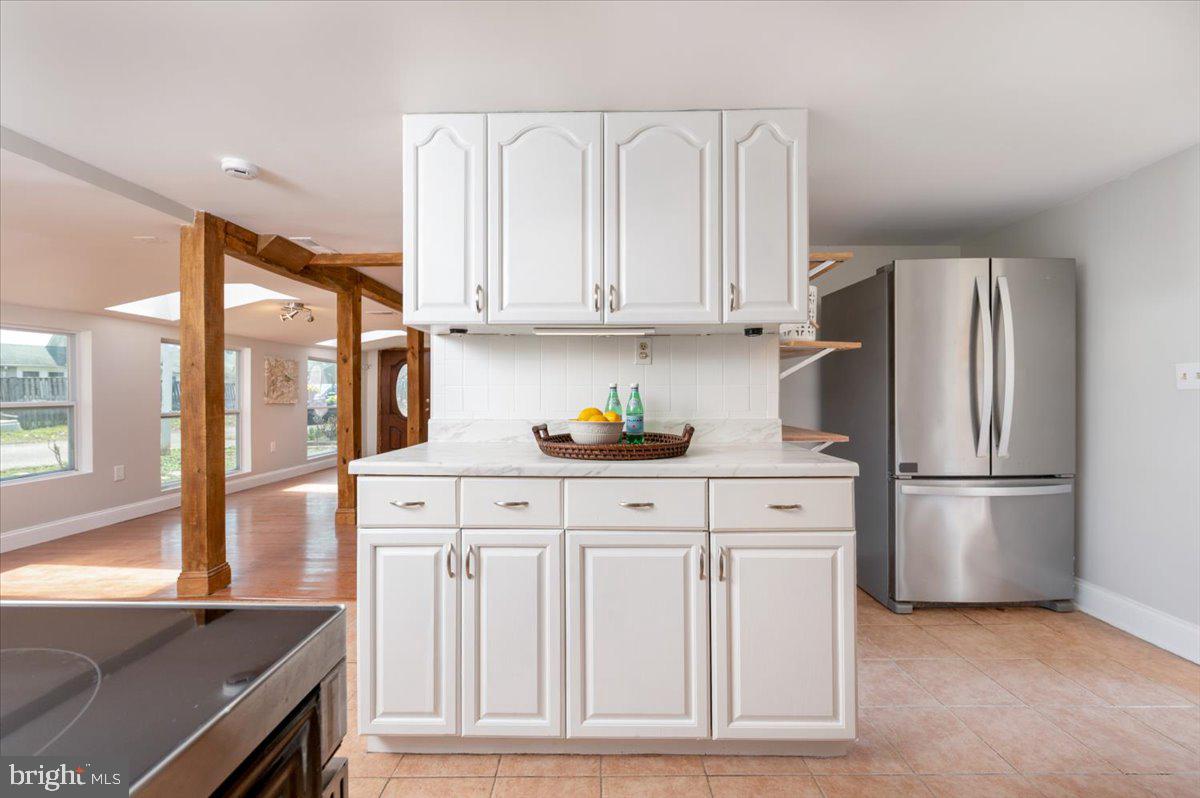 626 Clark Avenue Deale, MD 20751 - Photo 8 of 74 a kitchen with appliances cabinets and a window