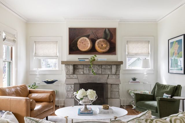 a living room with furniture and a fireplace