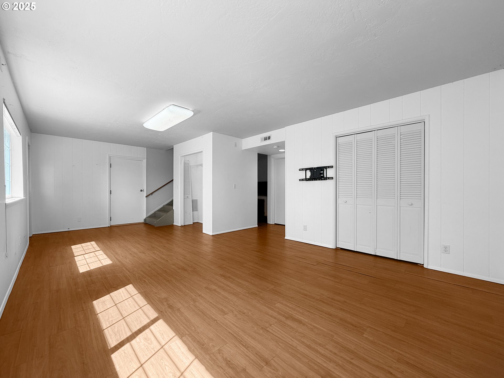 96741 Duley Creek Road Brookings, OR 97415 - Photo 21 of 36 a view of an empty room with wooden floor