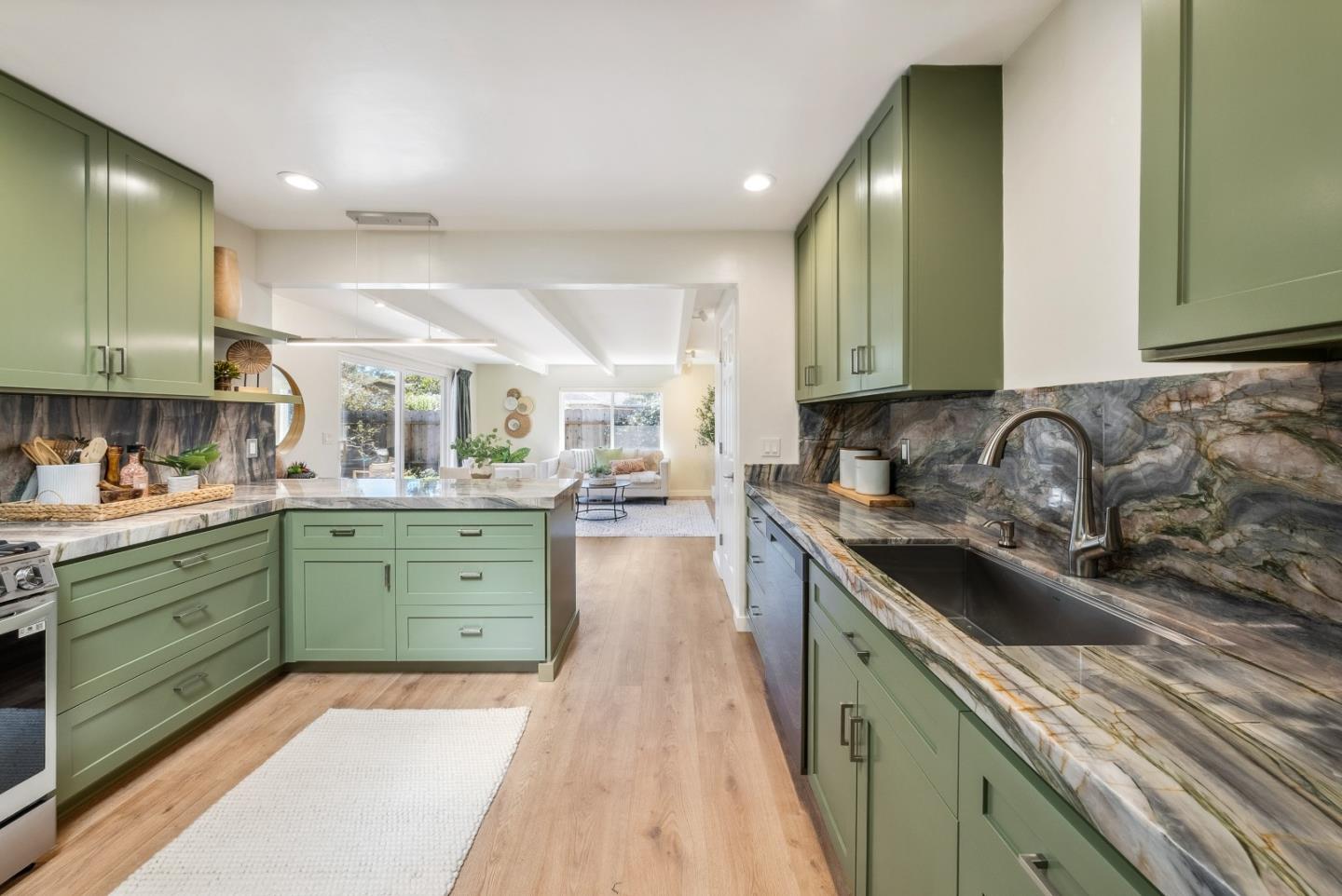 743 Marino Pines Road Pacific Grove, CA 93950 - Photo 13 of 55 a kitchen with a sink and cabinets