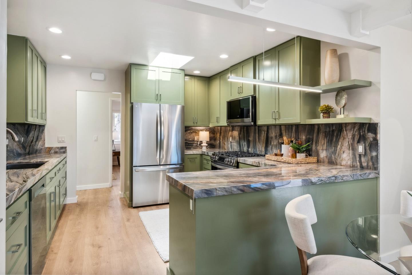 743 Marino Pines Road Pacific Grove, CA 93950 - Photo 14 of 55 a kitchen with sink cabinets and refrigerator