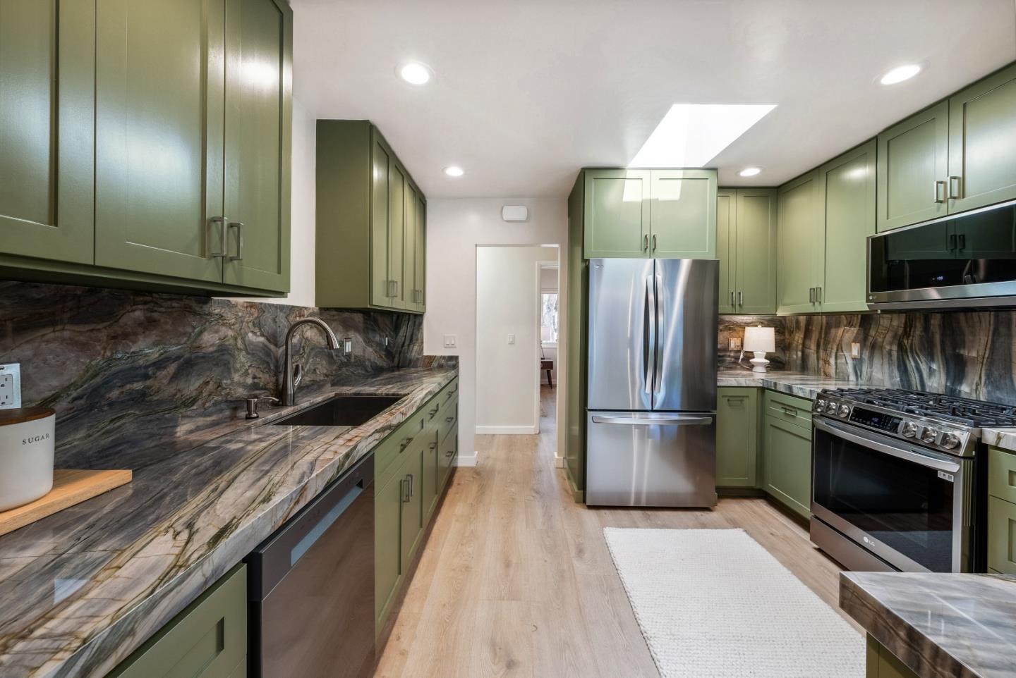 743 Marino Pines Road Pacific Grove, CA 93950 - Photo 15 of 55 a kitchen with a refrigerator sink and stove