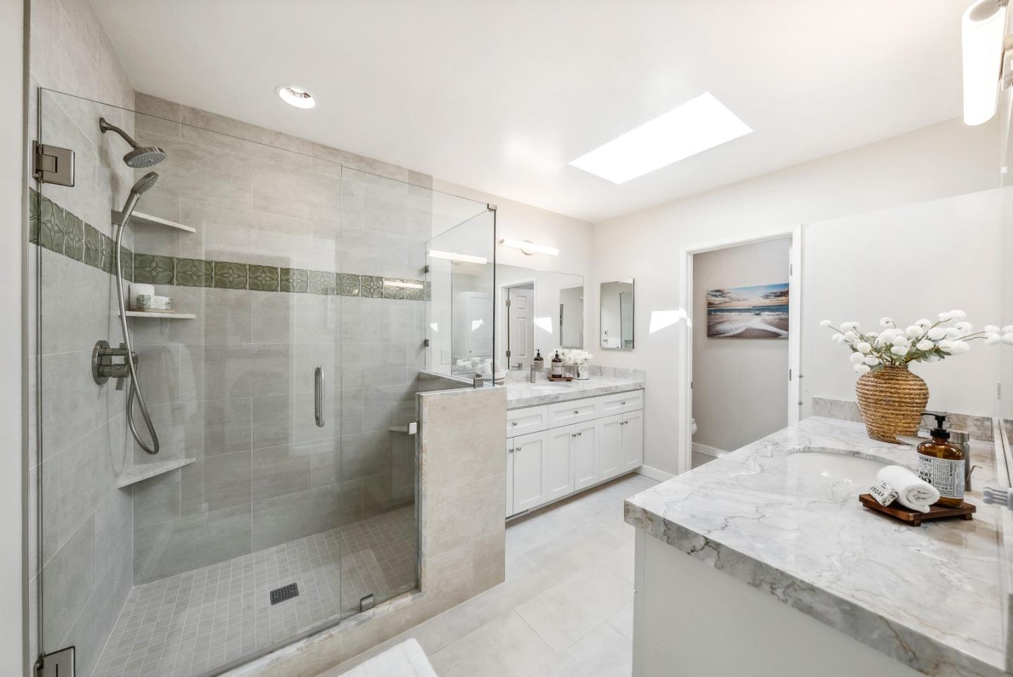 743 Marino Pines Road Pacific Grove, CA 93950 - Photo 28 of 55 a kitchen with a refrigerator a sink and cabinets