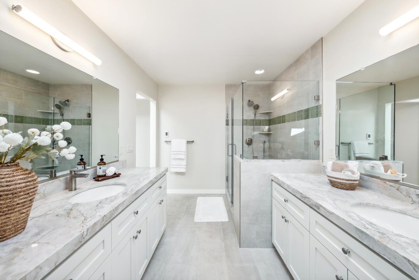 743 Marino Pines Road Pacific Grove, CA 93950 - Photo 30 of 55 a bathroom with a granite countertop sink mirror and double