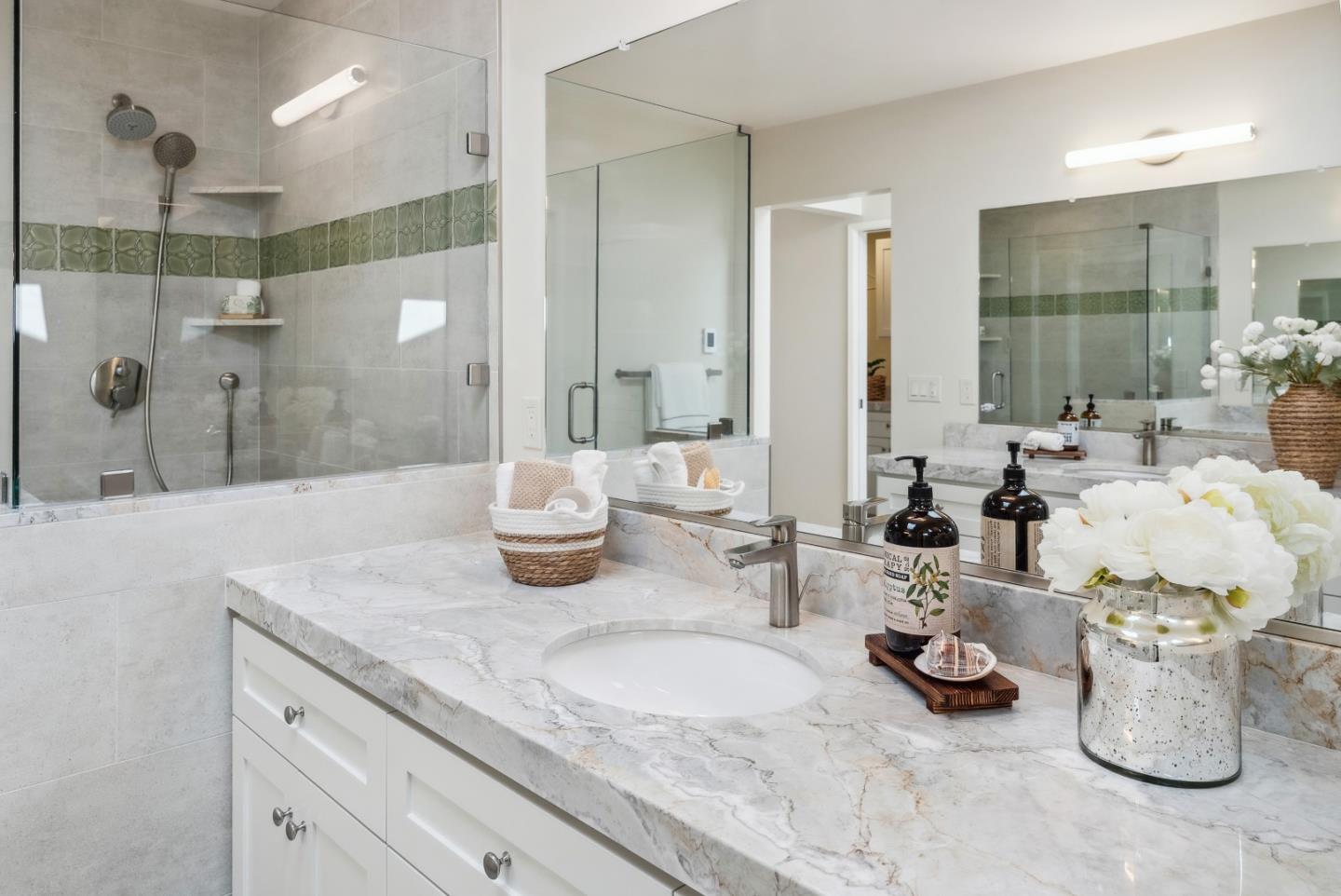 743 Marino Pines Road Pacific Grove, CA 93950 - Photo 31 of 55 a bathroom with a sink and mirror