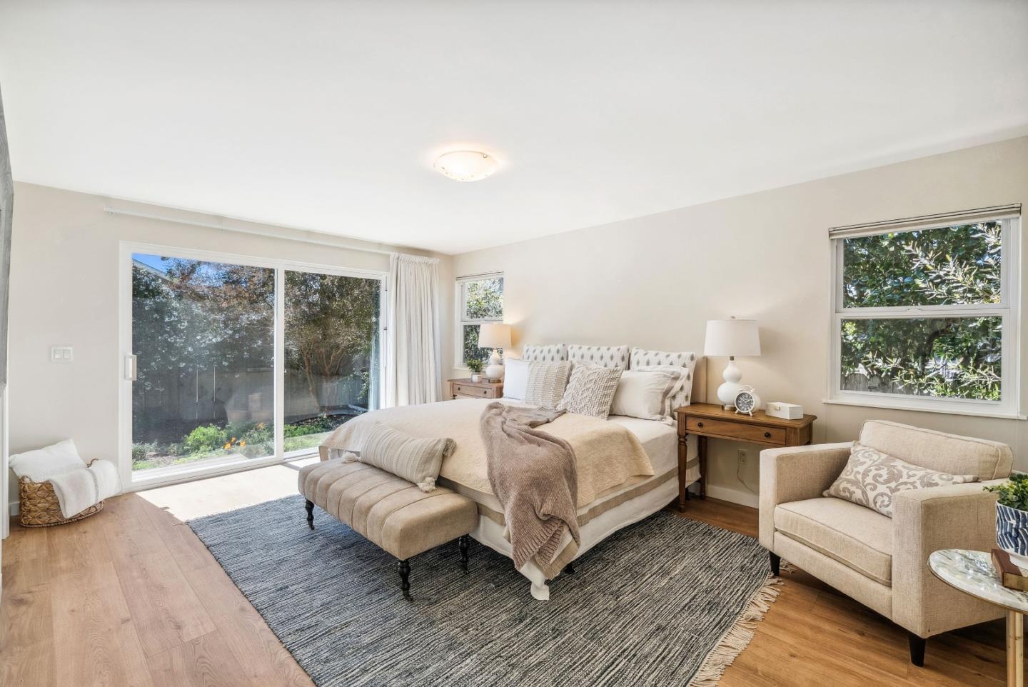 743 Marino Pines Road Pacific Grove, CA 93950 - Photo 32 of 55 a bedroom with bed couch and window