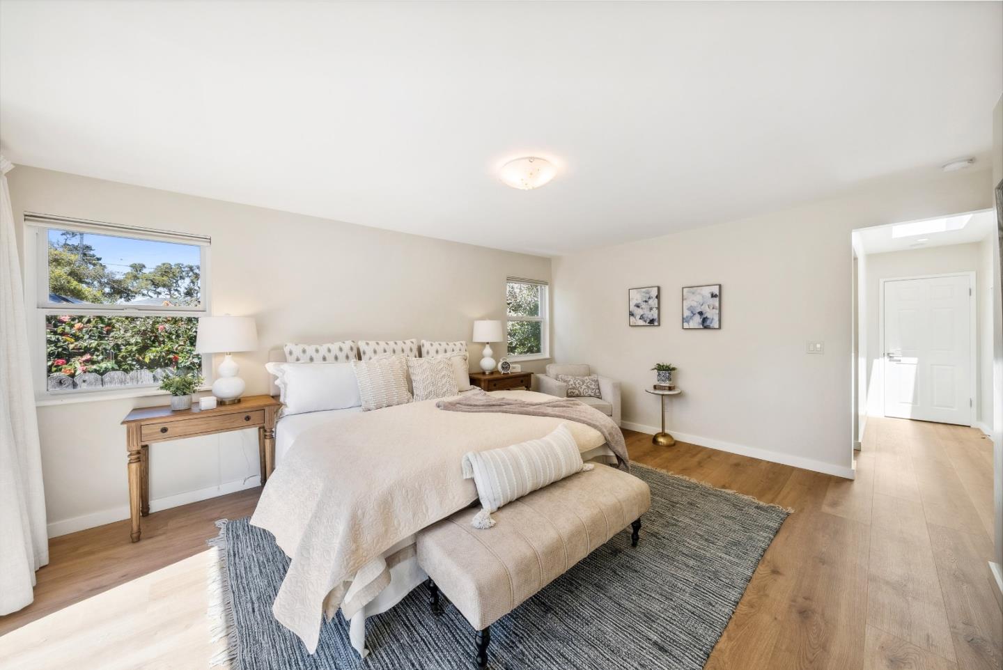 743 Marino Pines Road Pacific Grove, CA 93950 - Photo 33 of 55 a bedroom with a bed and a table