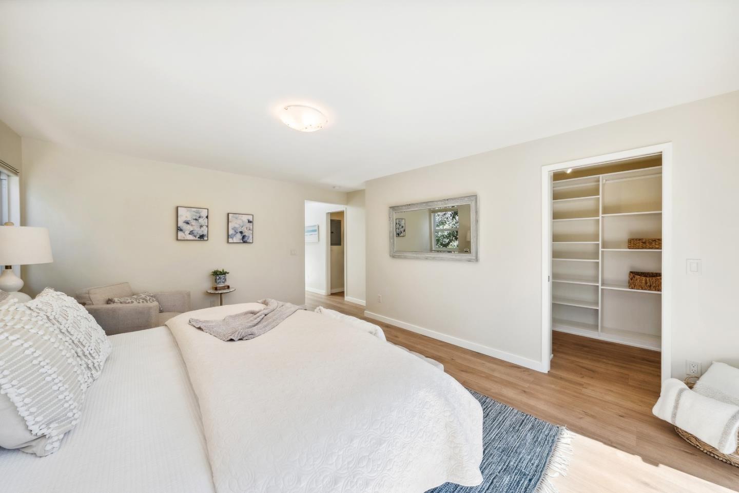 743 Marino Pines Road Pacific Grove, CA 93950 - Photo 34 of 55 a bedroom with a bed and a window
