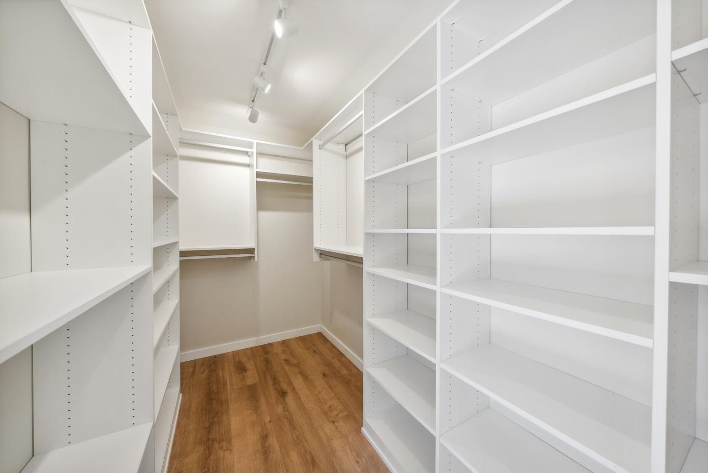 743 Marino Pines Road Pacific Grove, CA 93950 - Photo 35 of 55 a view of walk in closet with empty racks