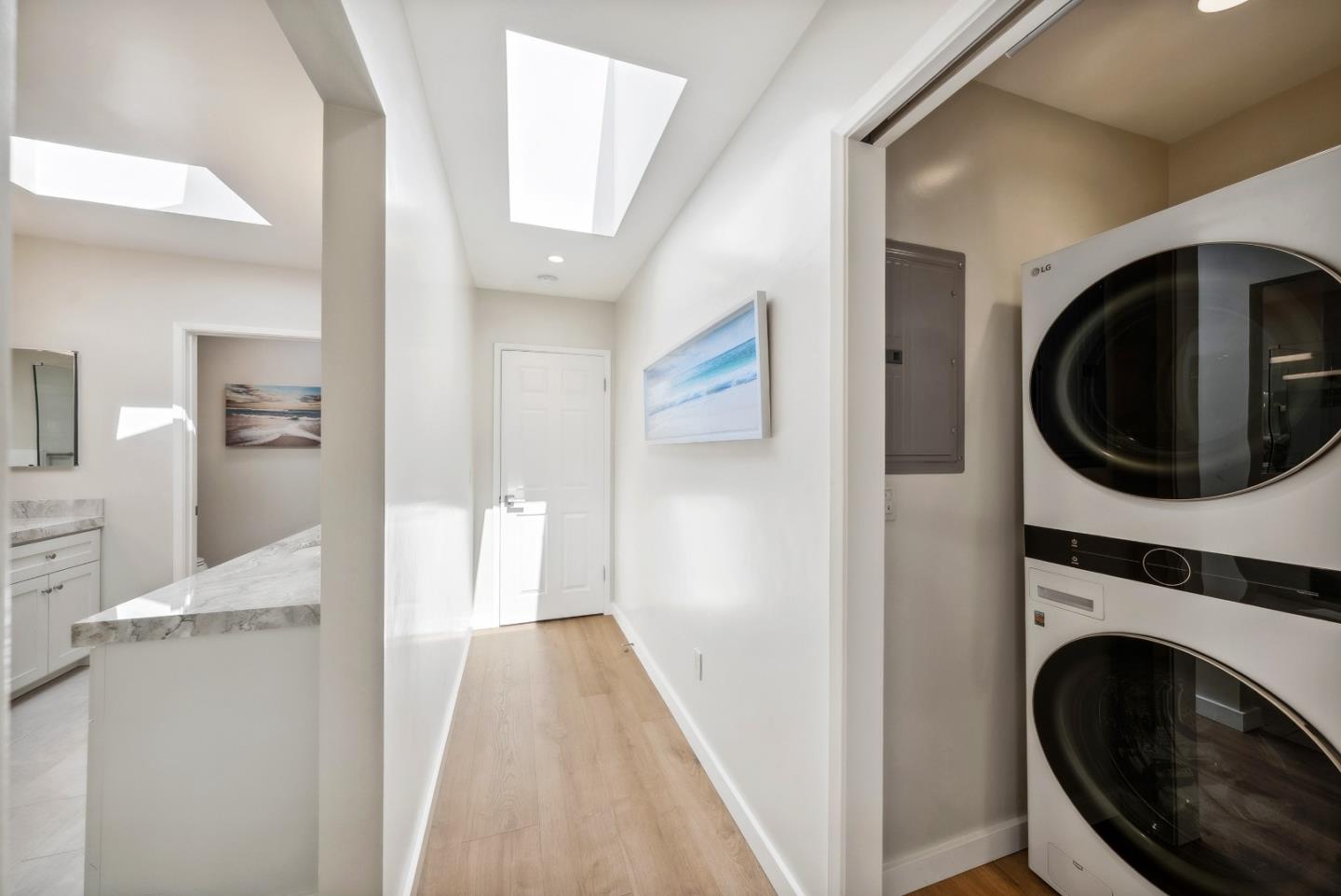 743 Marino Pines Road Pacific Grove, CA 93950 - Photo 36 of 55 a view of a hallway with washer and dryer