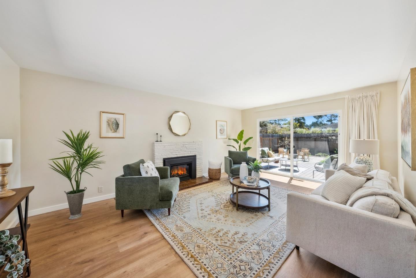 743 Marino Pines Road Pacific Grove, CA 93950 - Photo 4 of 55 a living room with furniture and a fireplace