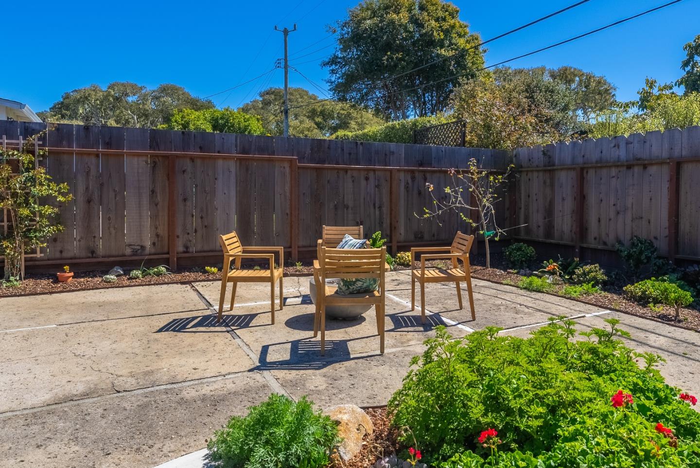 743 Marino Pines Road Pacific Grove, CA 93950 - Photo 42 of 55 a view of a chairs and tables in the backyard