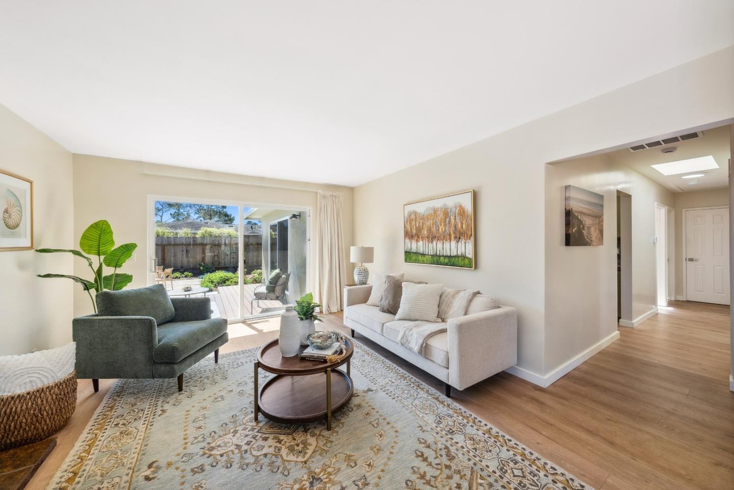 743 Marino Pines Road Pacific Grove, CA 93950 - Photo 6 of 55 a living room with furniture and a potted plant
