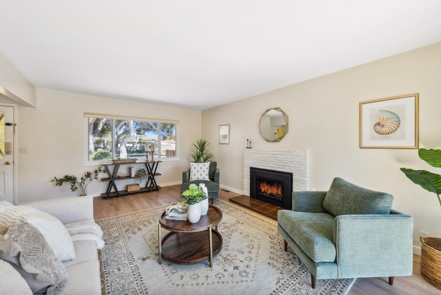 743 Marino Pines Road Pacific Grove, CA 93950 - Photo 8 of 55 a living room with furniture and a fireplace