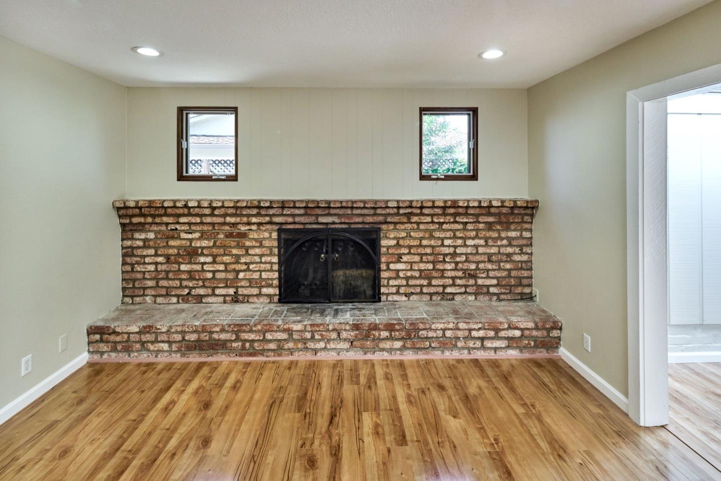 4841 Borina Drive San Jose, CA 95129 - Photo 11 of 26 wooden floor with a fireplace