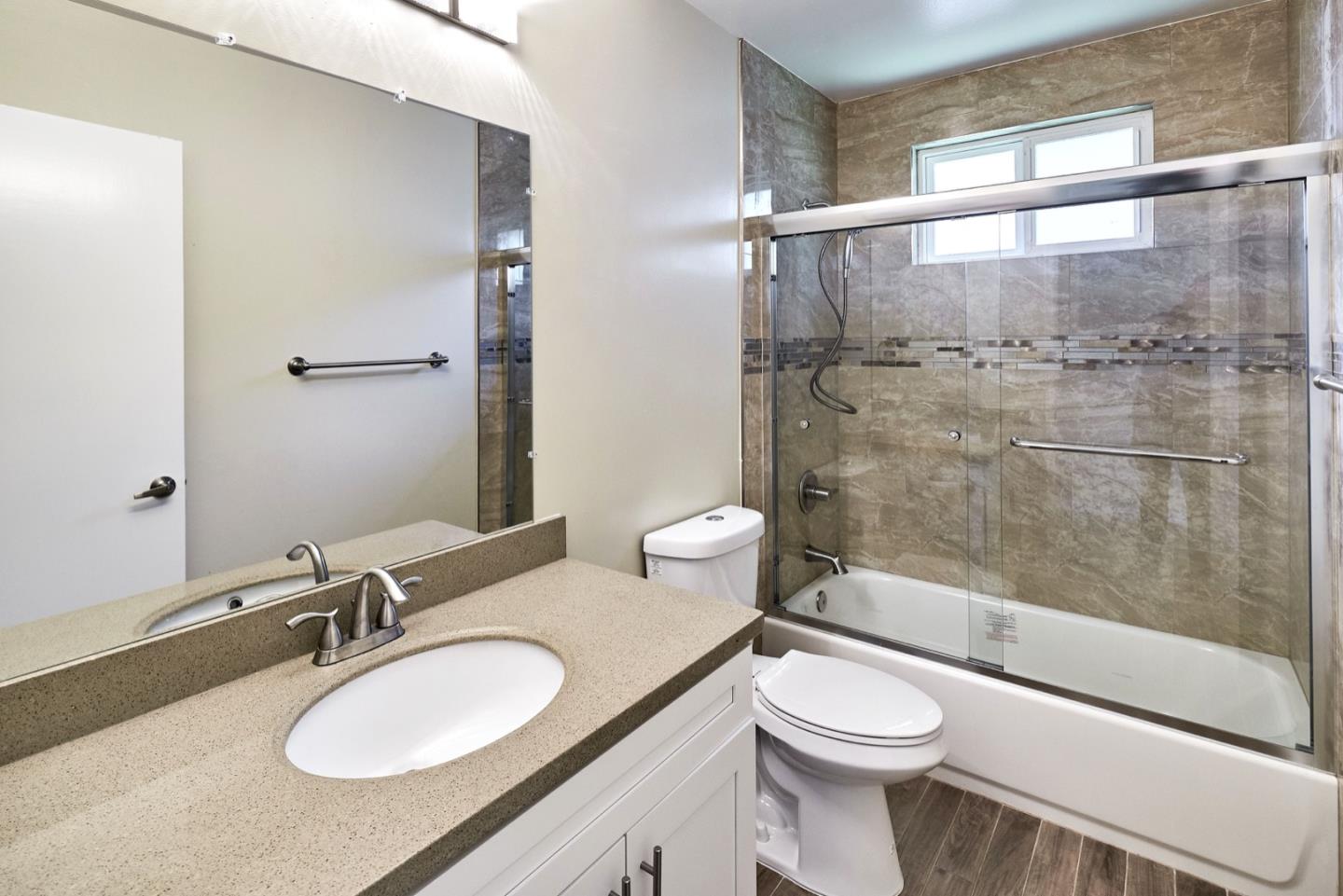 4841 Borina Drive San Jose, CA 95129 - Photo 16 of 26 a bathroom with a sink toilet and shower
