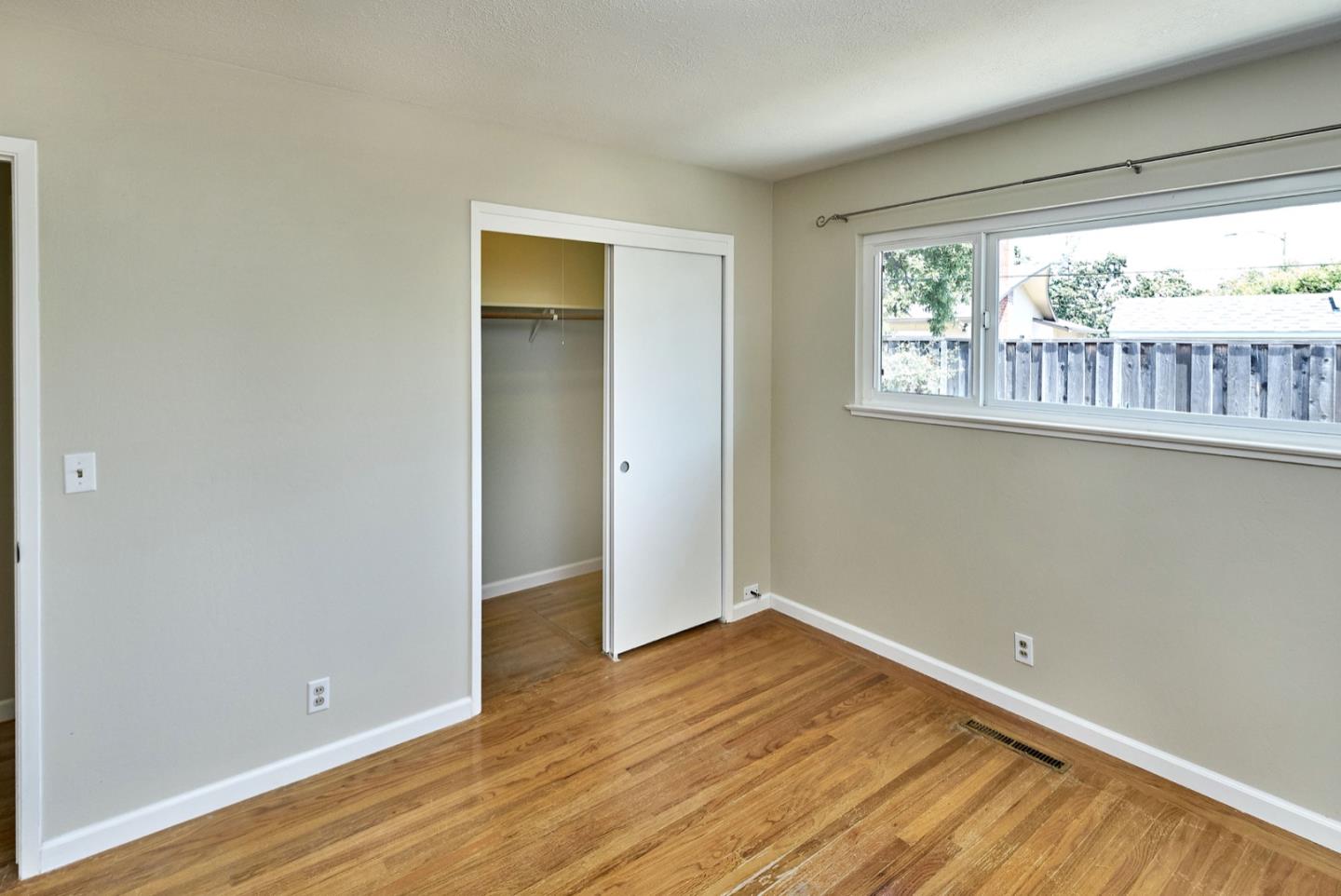 4841 Borina Drive San Jose, CA 95129 - Photo 20 of 26 wooden floor in an empty room with a window