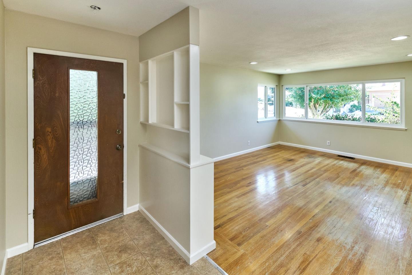 4841 Borina Drive San Jose, CA 95129 - Photo 2 of 26 wooden floor in an empty room with a window