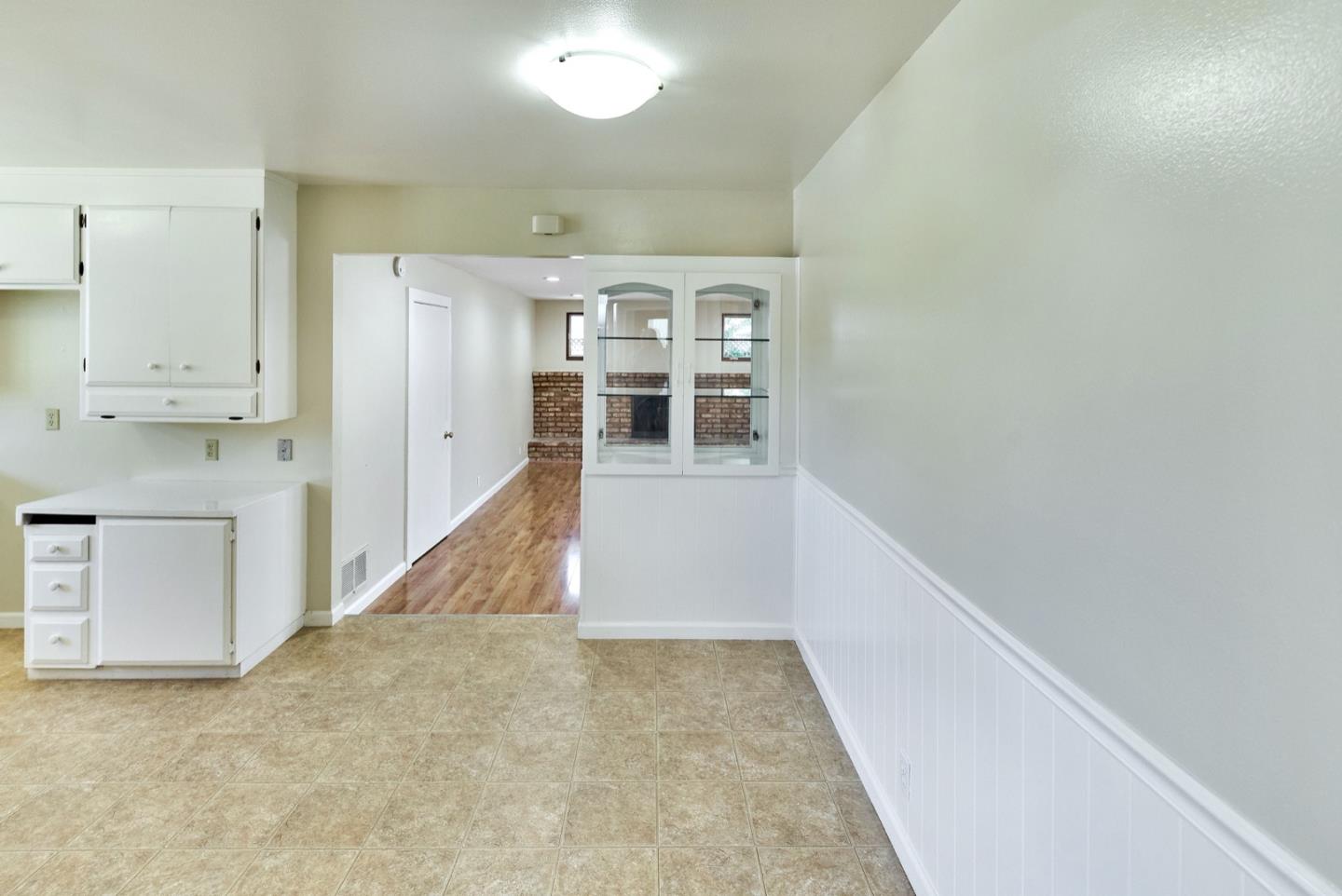 4841 Borina Drive San Jose, CA 95129 - Photo 5 of 26 wooden floor in an empty room with a fireplace