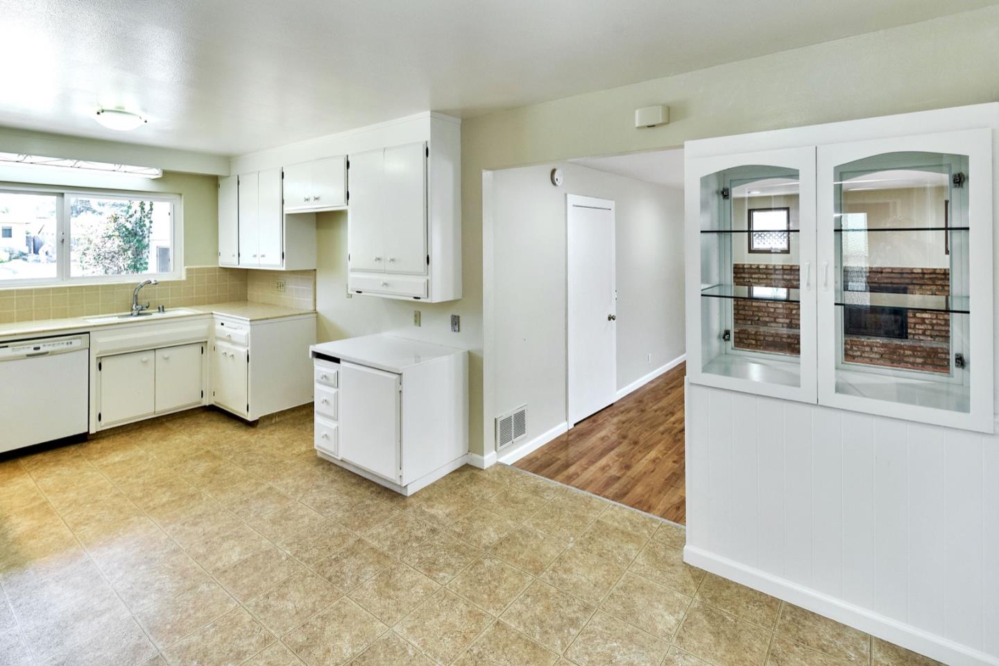 4841 Borina Drive San Jose, CA 95129 - Photo 6 of 26 a room with lot of cabinets and wooden floor