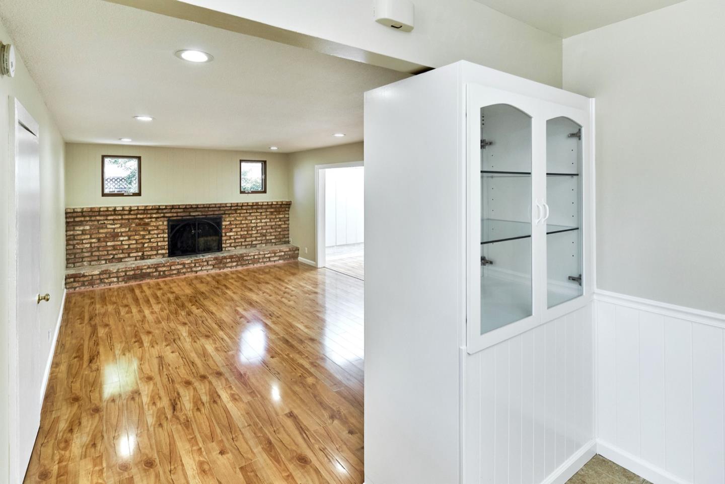 4841 Borina Drive San Jose, CA 95129 - Photo 9 of 26 a view of a bedroom with wooden floor and entryway