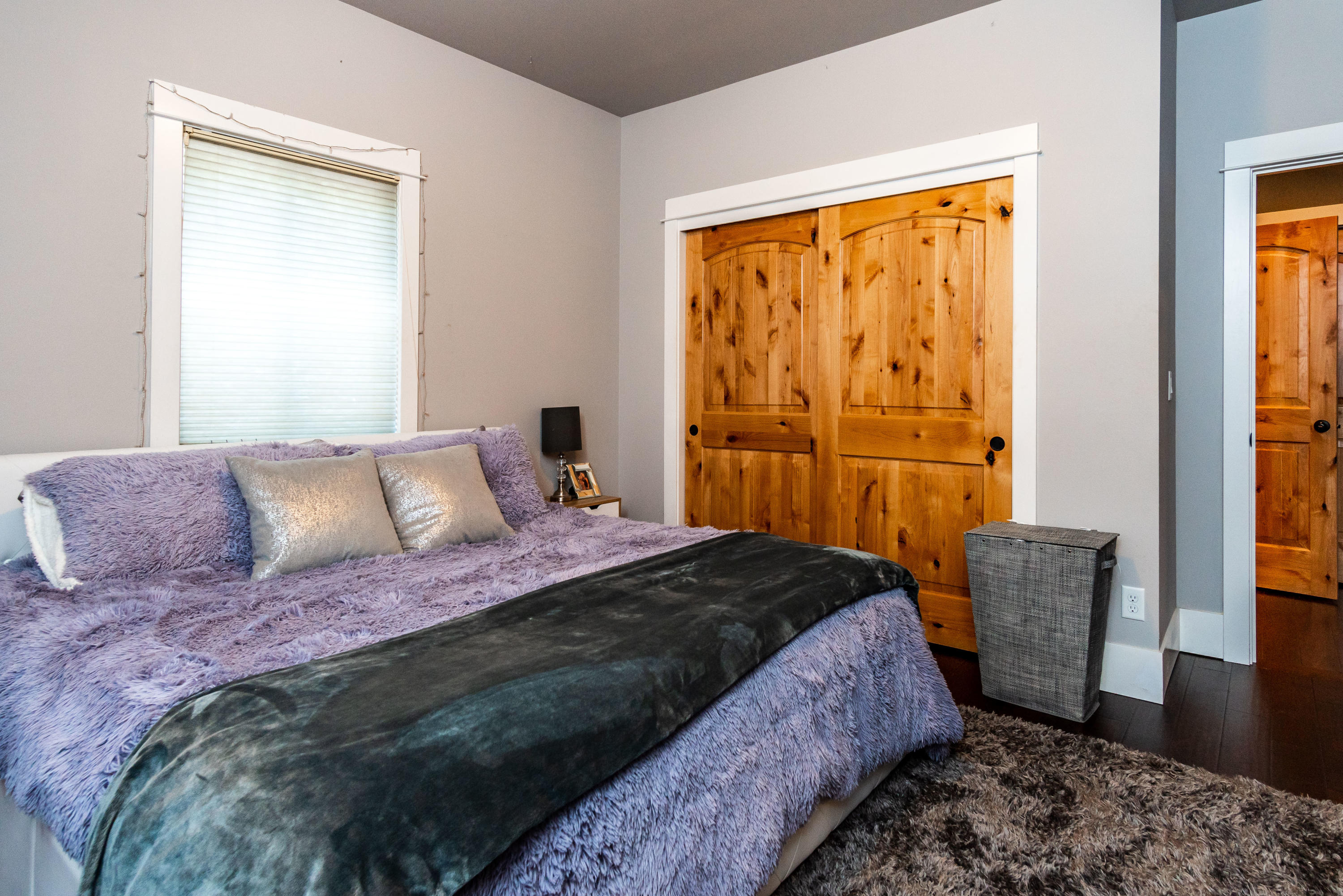 19525 Apache Road Bend, OR 97702 - Photo 25 of 47 a bedroom with a bed and a window