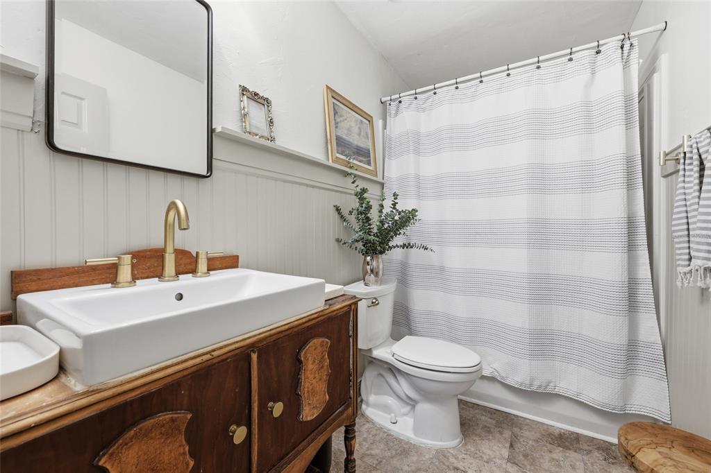 14285 Southwest 174th Street Archer, FL 32618 - Photo 15 of 25 a bathroom with a sink a toilet and shower
