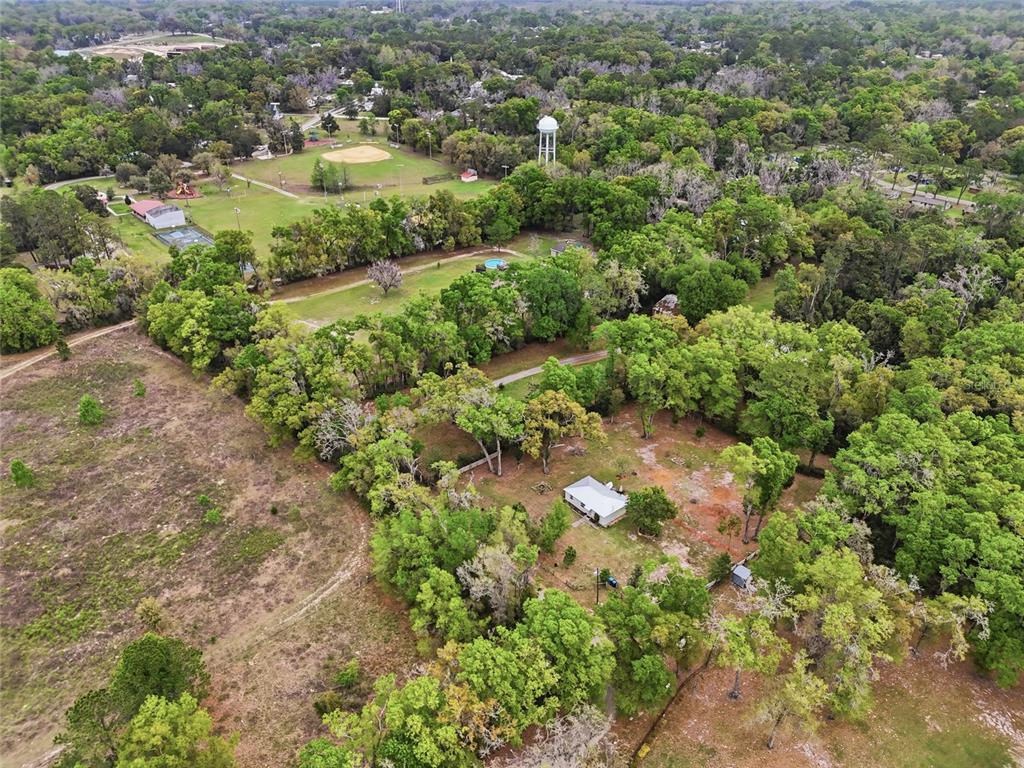 14285 Southwest 174th Street Archer, FL 32618 - Photo 19 of 25 an aerial view of residential houses with outdoor space and trees