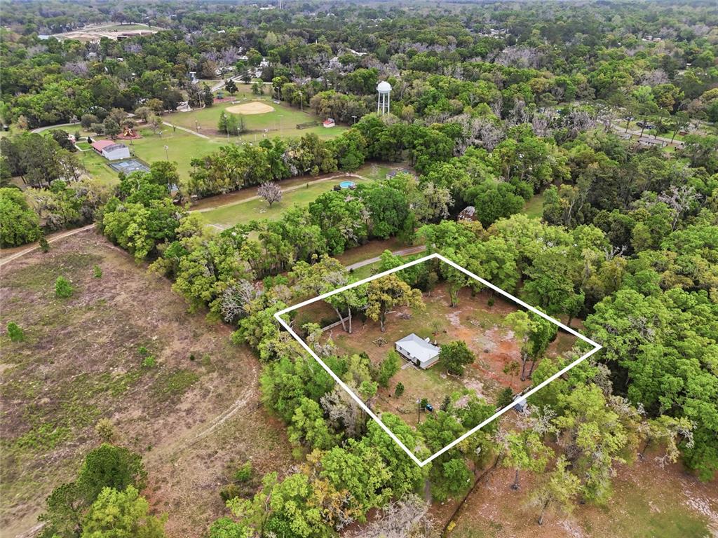 14285 Southwest 174th Street Archer, FL 32618 - Photo 20 of 25 an aerial view of a tennis court
