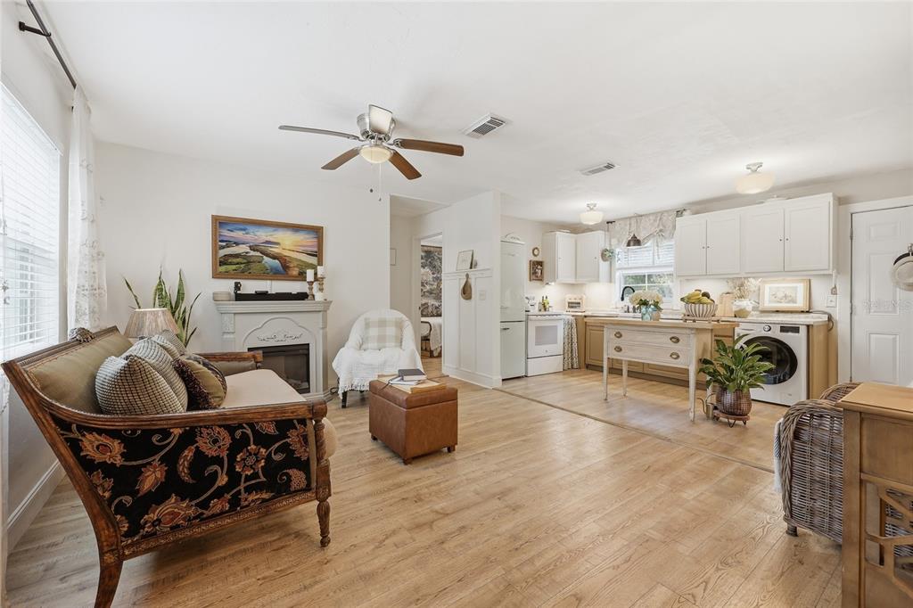 14285 Southwest 174th Street Archer, FL 32618 - Photo 5 of 25 a living room with furniture and a fireplace