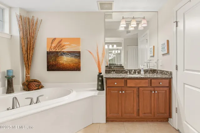 a bathroom with a sink double vanity and a mirror