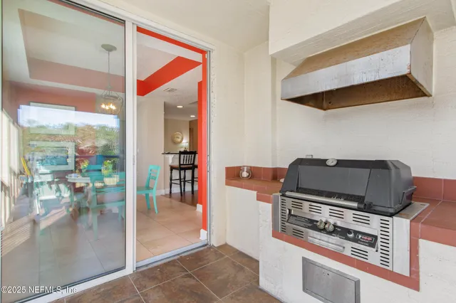 a kitchen with a stove and a microwave