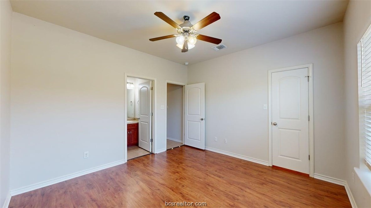 4453-4455 Reveille Road College Station, TX 77845 - Photo 13 of 37 wooden floor in an empty room