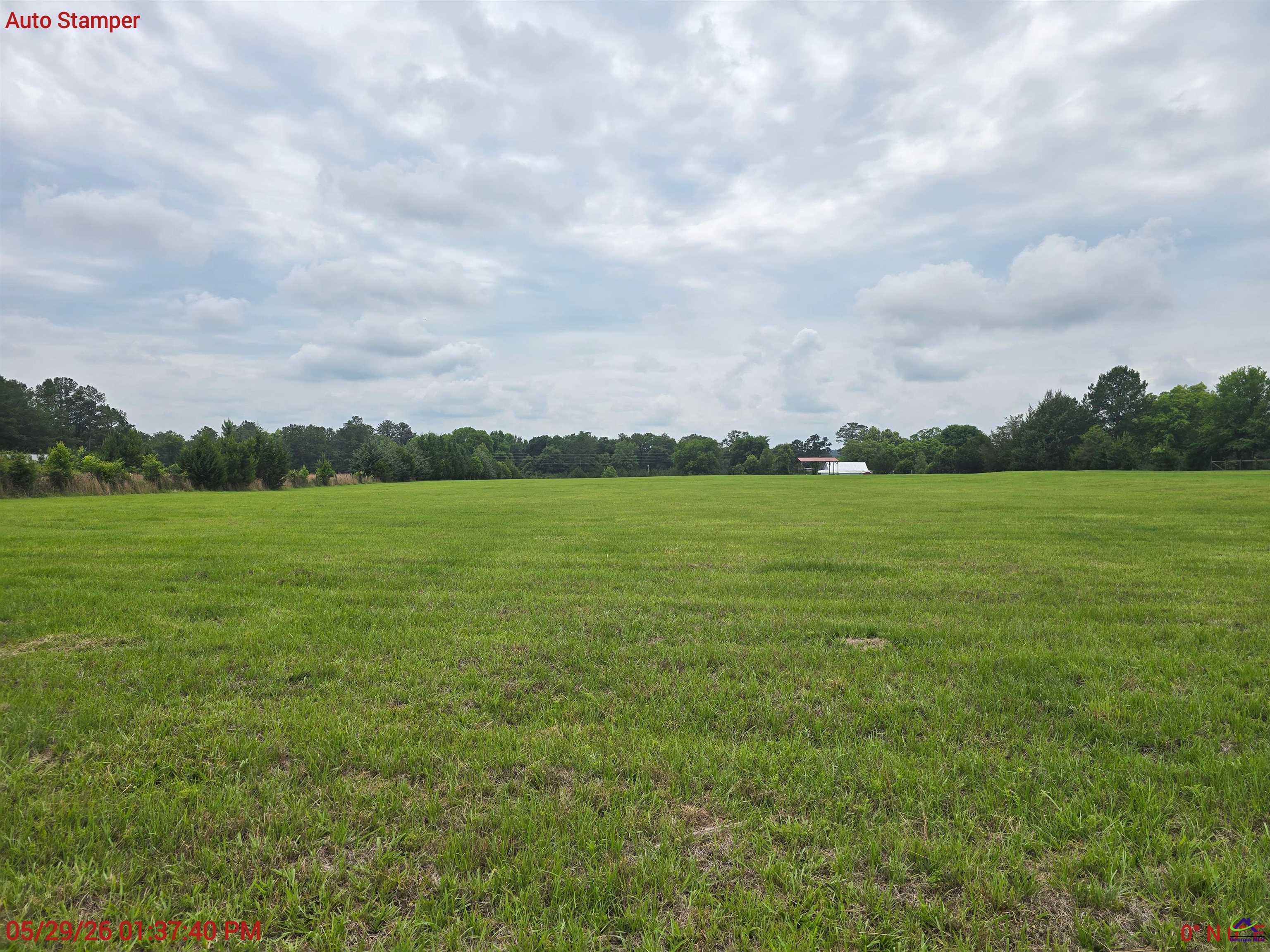 Lot 8 Avera Road Roberta, GA 31078 - Photo 7 of 7 a view of a lake with houses in the back