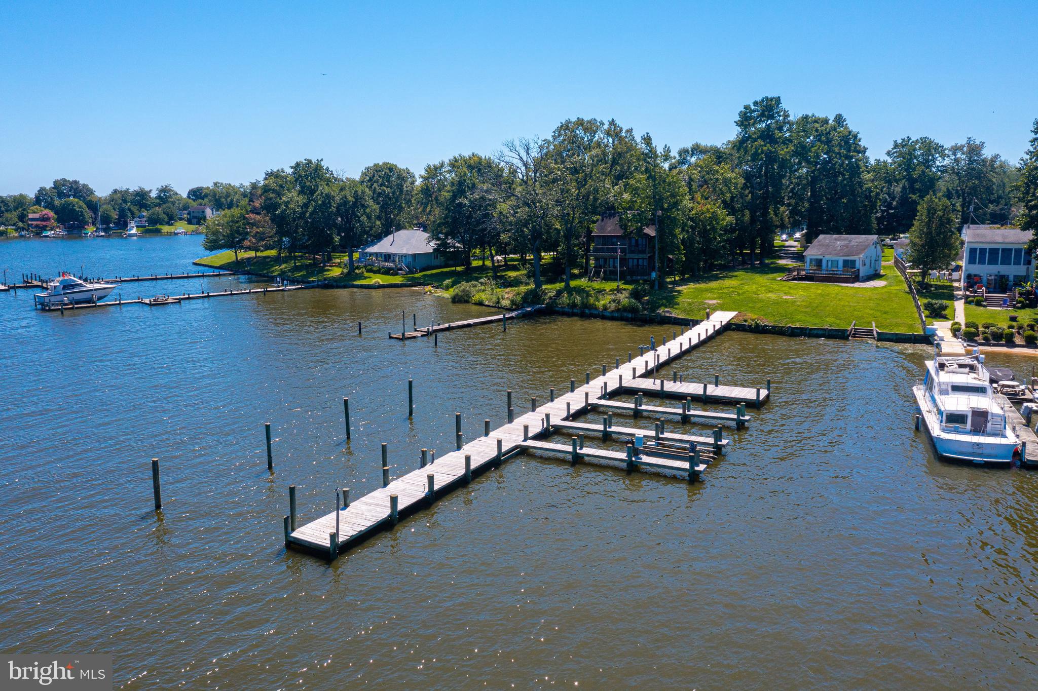 1937 Cape May Road Essex, MD 21221 - Photo 19 of 23 an aerial view of a house with a garden and lake view