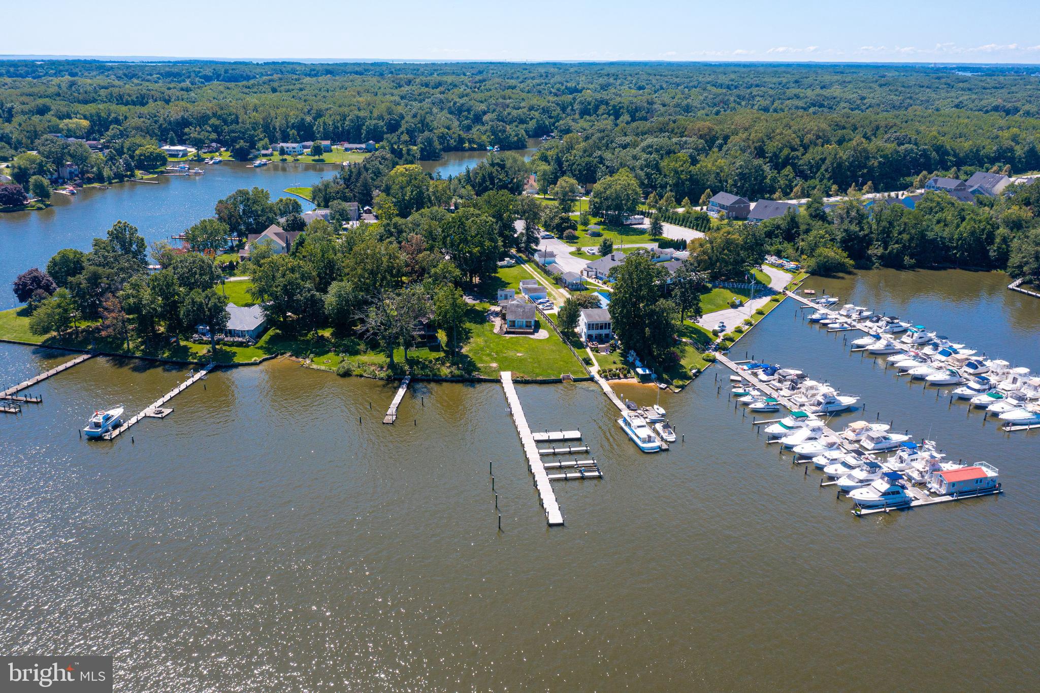 1937 Cape May Road Essex, MD 21221 - Photo 20 of 23 an aerial view of a house with a garden and lake view