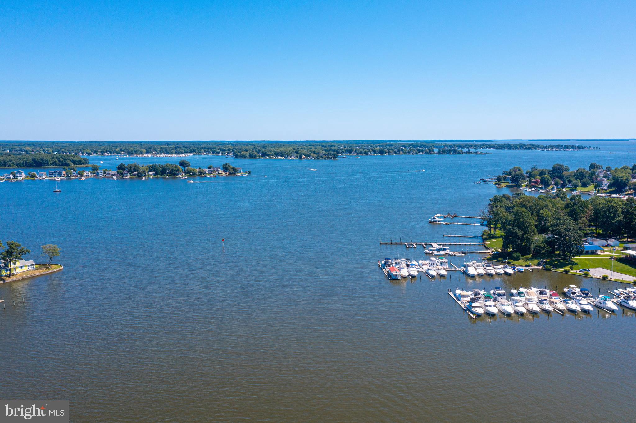 1937 Cape May Road Essex, MD 21221 - Photo 22 of 23 a view of a lake with houses in back