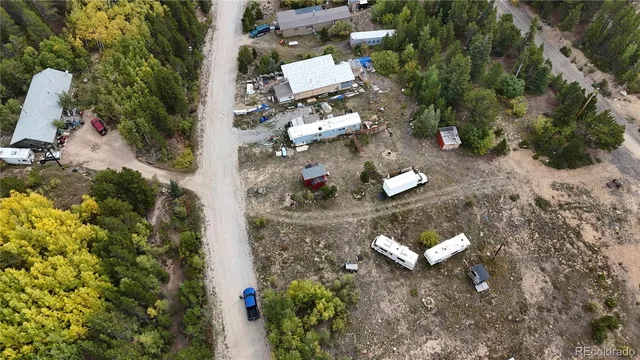 a view of a street with a yard