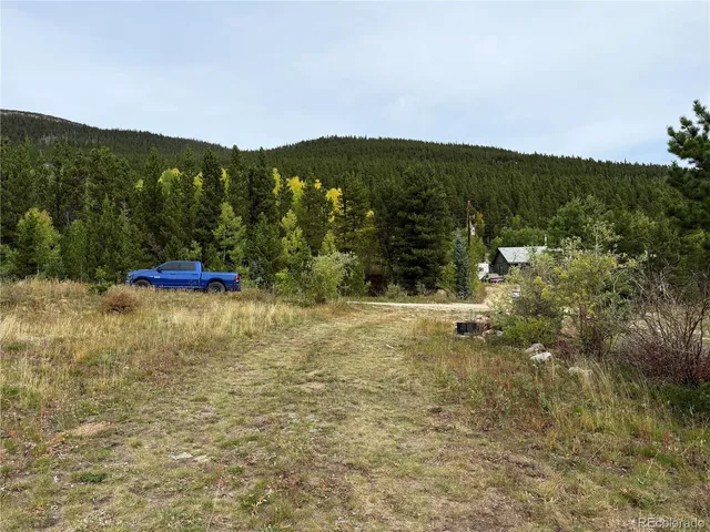 a view of lake with mountain