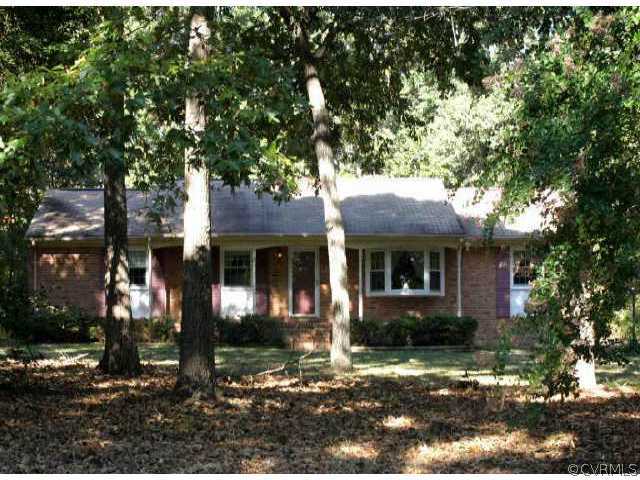 7810 Varann Road Richmond, VA 23231 - Photo 1 of 1 a front view of a house with yard