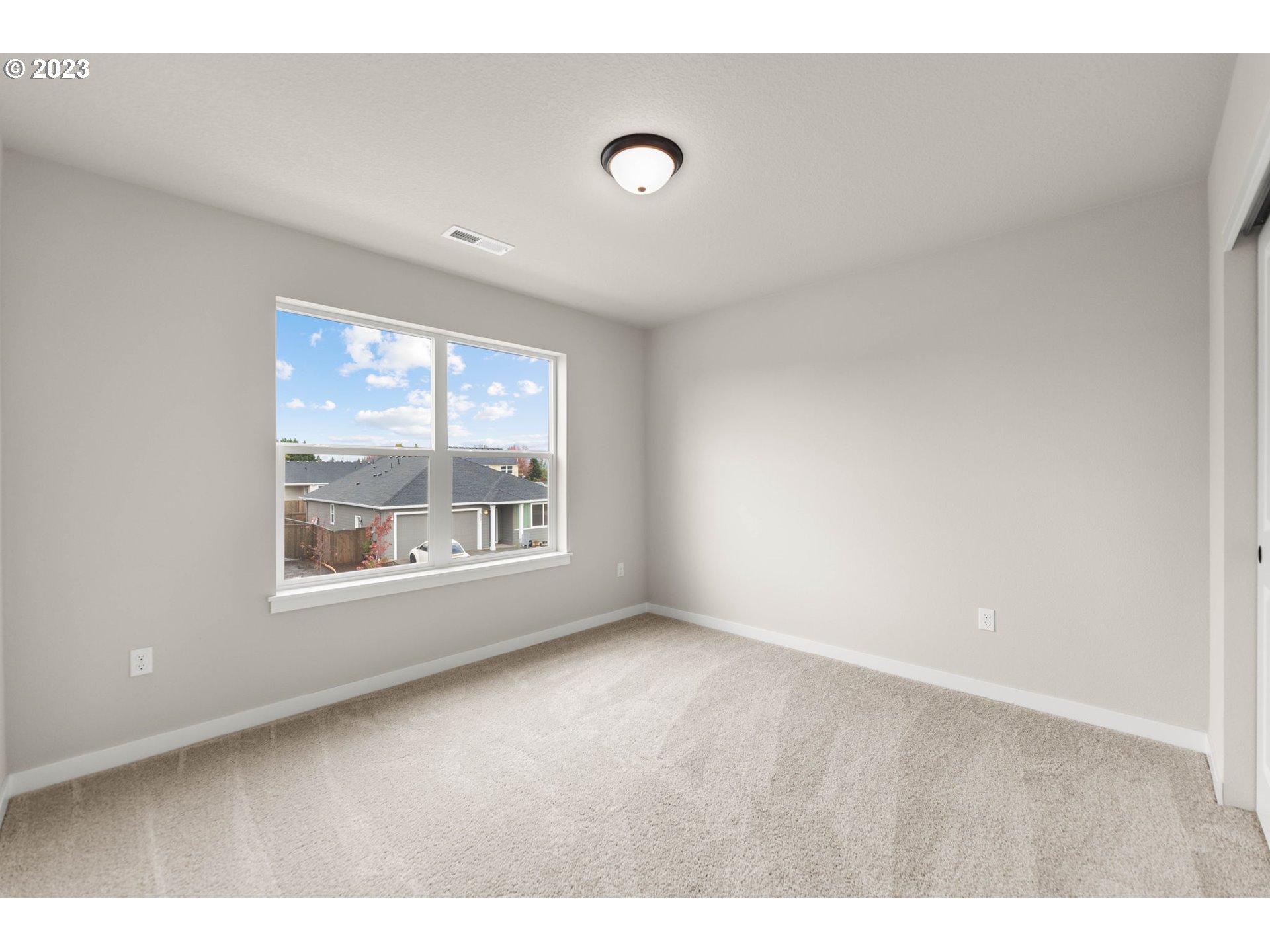 8847 North 3rd Circle Ridgefield, WA 98642 - Photo 34 of 40 a view of an empty room with a window