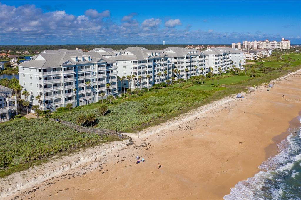 900 Cinnamon Beach Way, Unit 845 Palm Coast, FL 32137 - Photo 1 of 1 a view of a pathway with a yard