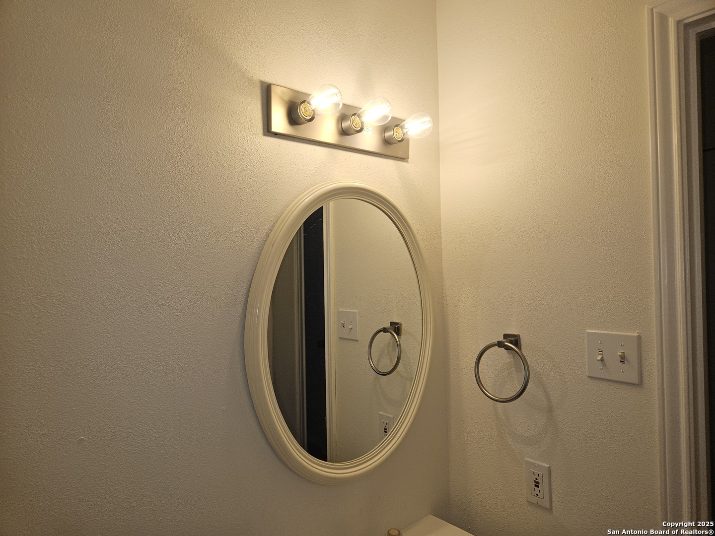 7715 Rustic Lane San Antonio, TX 78230 - Photo 14 of 26 a close view of utility room with washer and dryer