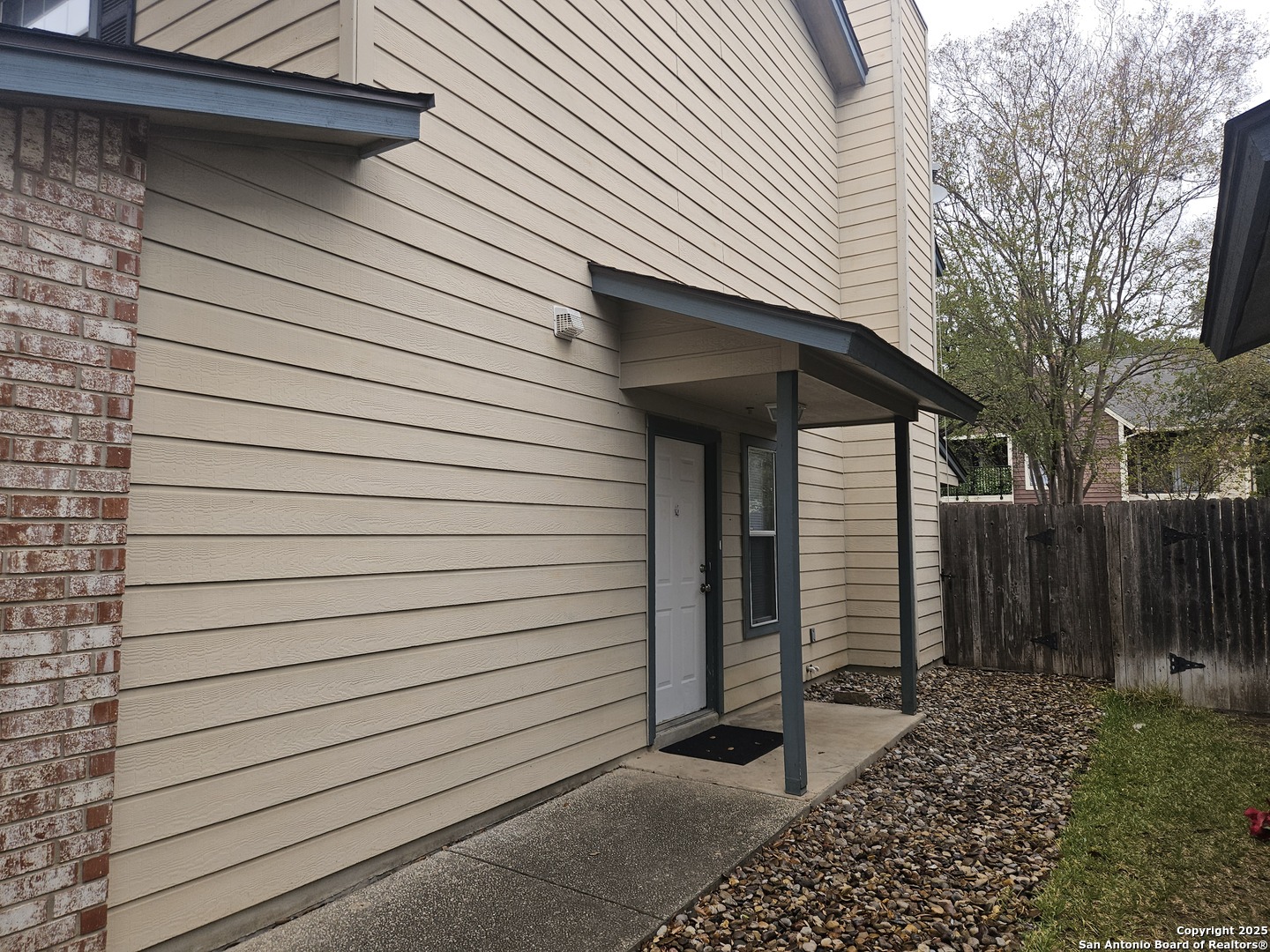 7715 Rustic Lane San Antonio, TX 78230 - Photo 2 of 26 a view of a house with a door