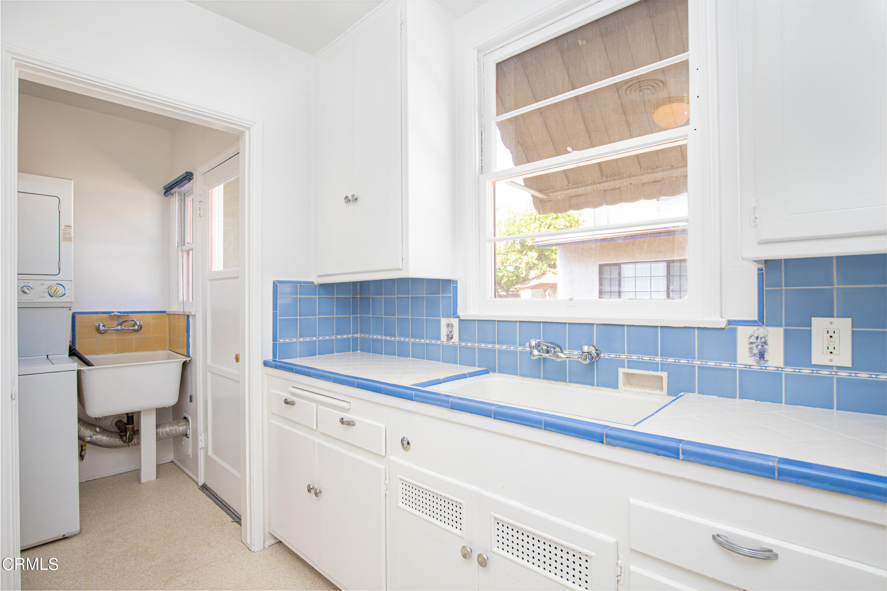 1562 Riverside Drive Glendale, CA 91201 - Photo 5 of 12 a kitchen with a sink and a window