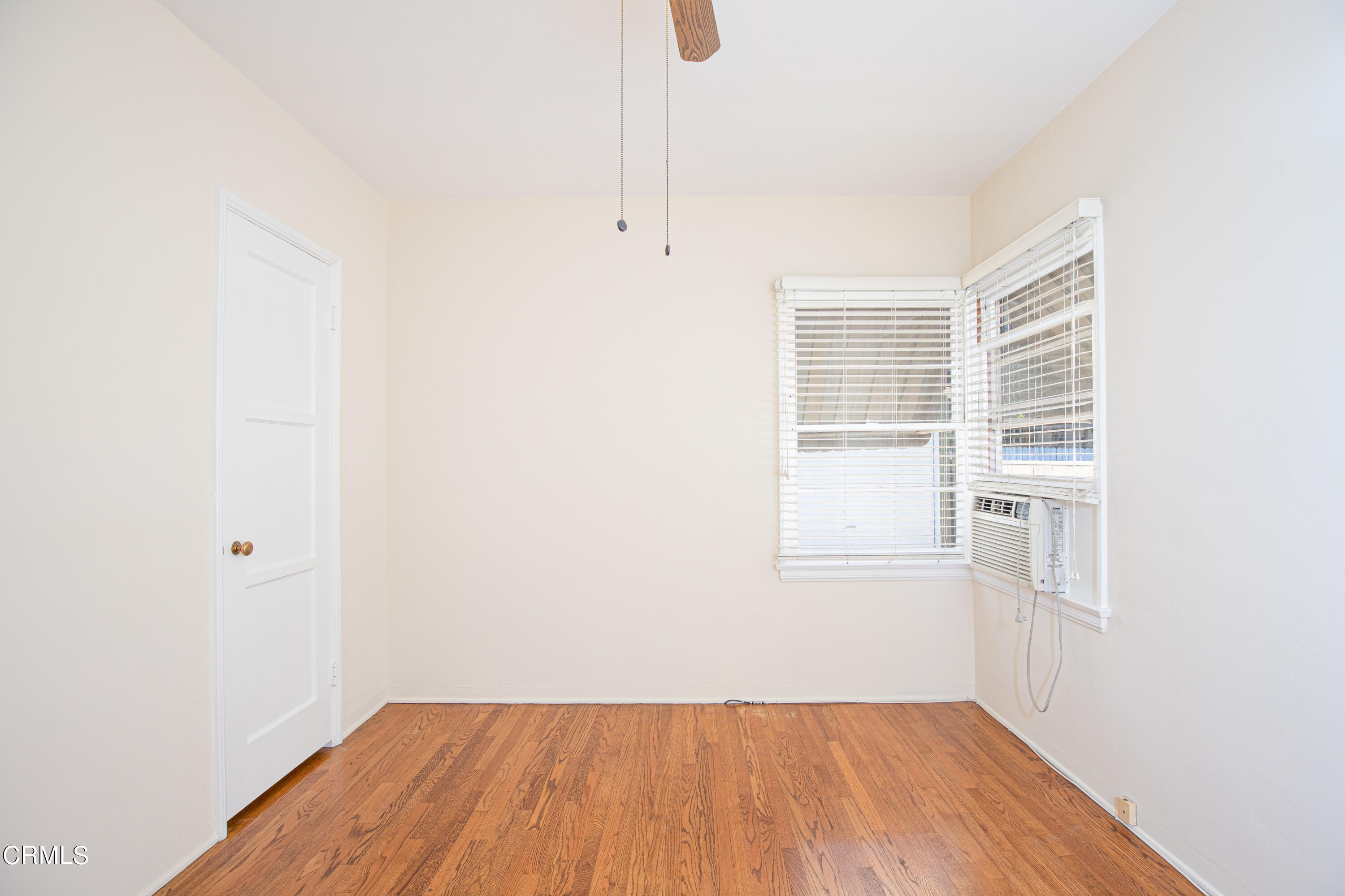 1562 Riverside Drive Glendale, CA 91201 - Photo 7 of 12 a view of a room with wooden floor and windows