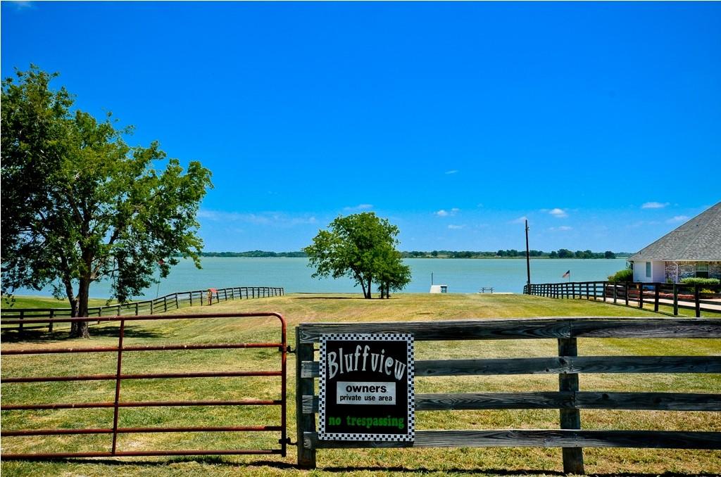 47-79 Bluffview Estates Road Corsicana, TX 75109 - Photo 18 of 20 a view of a swimming pool with a yard
