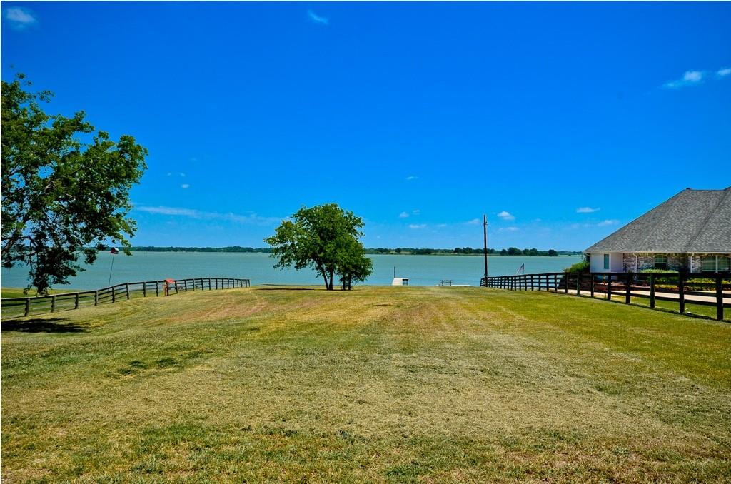 47-79 Bluffview Estates Road Corsicana, TX 75109 - Photo 19 of 20 a view of a swimming pool with an outdoor space and seating area