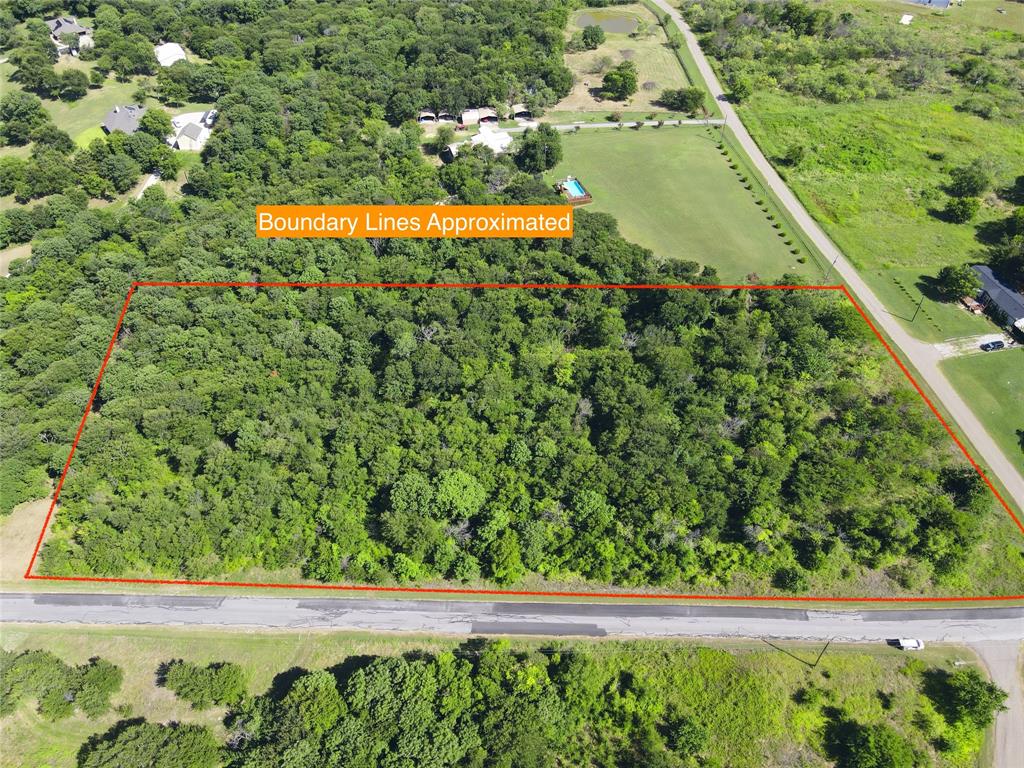 47-79 Bluffview Estates Road Corsicana, TX 75109 - Photo 8 of 20 a view of a yard with a small plants